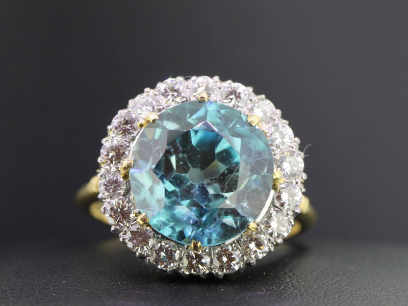Magnificent 10.5 carat zircon and diamond 18 carat gold halo ring