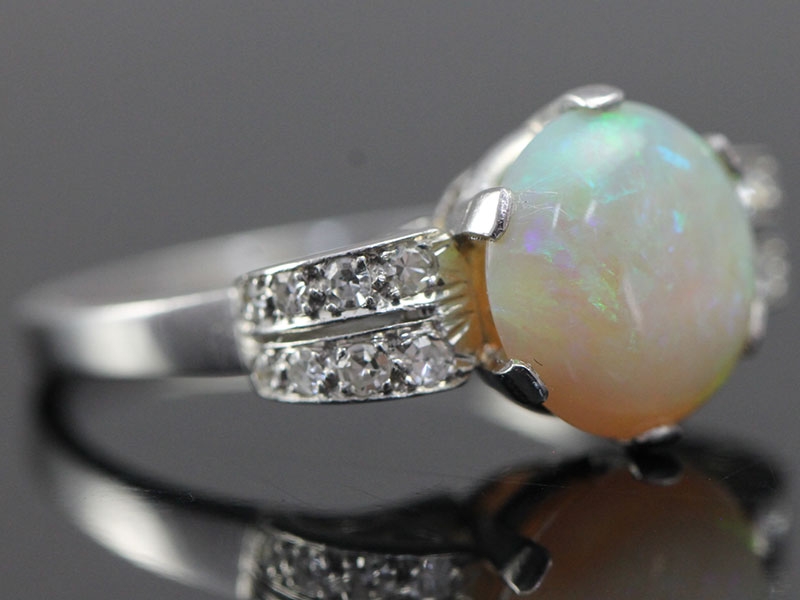Stunning art deco opal and diamond pltinum ring