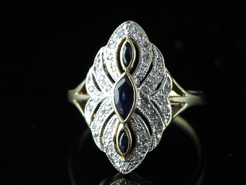 		 beautiful nevette shaped sapphire and diamond 9 carat gold cluster ring		
