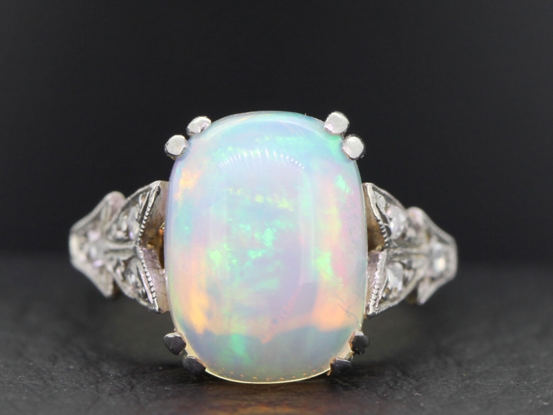 Stunning opal and diamond 18 carat gold and platinum ring