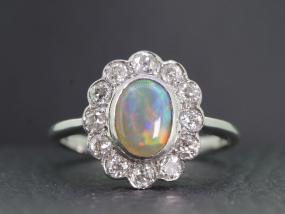 SPELLBINDING BLACK OPAL AND DIAMOND PLATINUM CLUSTER RING