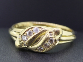 BEAUTIFUL EDWARDIAN DIAMOND AND RUBY SNAKE 18 CARAT GOLD RING	