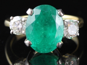 FABULOUS FIVE AND A HALF CARAT COLUMBIAN EMERALD AND DIAMOND TRILOGY RING 