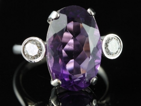 AMAZING 7 CARAT AMETHYST AND DIAMOND TRILOGY 18 CARAT GOLD RING