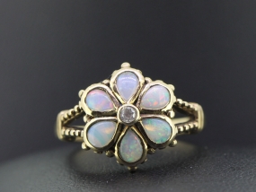EQUISITE 9 CARAT GOLD OPAL AND DIAMOND DAISY FLOWER RING