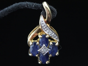 GLAMOUROUS SAPPHIRE AND DIAMOND 9 CARAT GOLD PENDANT