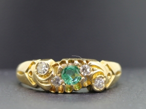 FABULOUS EMERALD AND DIAMOND 18 CARAT GOLD BAND WITH CHESTER HALLMARK