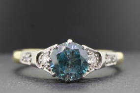 STUNNING BLUE ZIRCON AND DIAMOND 18 CARAT GOLD RING