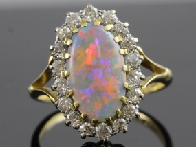 AN ORIGINAL EDWARDIAN OPAL AND DIAMOND 18CT GOLD RING