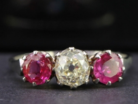 STUNNING BURMESE RUBY AND DIAMOND THREE STONE PLATINUM RING