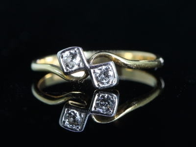 Edwardian Cross Over Diamond Platinum and 18ct Gold Ring