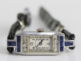 A FINE LADIES PLATINUM, SAPPHIRE AND  DIAMOND BENSON COCKTAIL WATCH